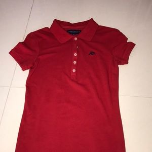 A red polo shirt